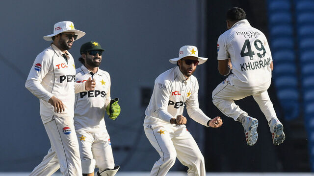Bowler Khurram Shahzad of Pakistan celebrates with teammates Azan Awais (L), wicketkeeper Mohammad Rizwan (C-L) and Salman Ali Agha after batsman Roston Chase of West Indies (unseen) was caught behind for 8 runs during the third day of the first Test cricket match between West Indies and Pakistan at the Brian Lara Cricket Academy in Tarouba, Trinidad and Tobago, on July 27, 2026.