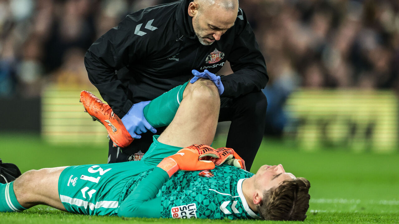 Sunderland goalkeeper Melker Ellborg receives treatment during the Premier League match between Leeds United and Sunderland at Elland Road in Leeds, United Kingdom, on March 3, 2026.