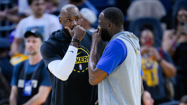 SAN FRANCISCO, CALIFORNIA - FEBRUARY 28: LeBron James of Lakers and Draymond Green of Warriors chat before the NBA game 31 between Los Angeles Lakers and Golden State Warriors in San Francisco at Chase Center on February 28, 2026 in San Francisco, California, United States.
