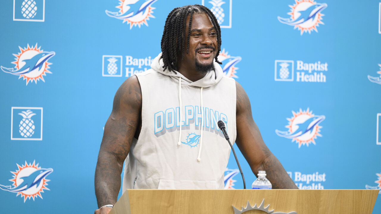 MIAMI GARDENS, FL - JULY 28: Miami Dolphins quarterback Malik Willis smiles as he speaks to the media during the Miami Dolphins Training Camp on August 28, 2026, at the Baptist Health Training Complex in Miami Gardens, FL.