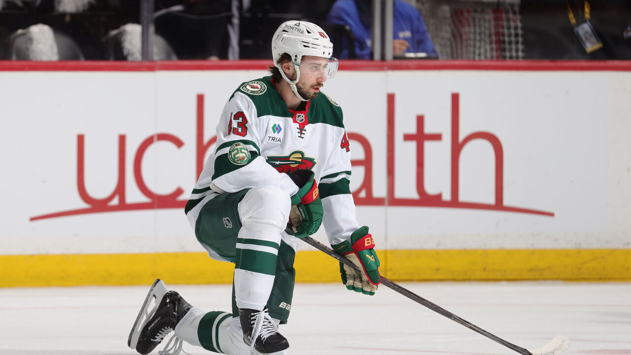 DENVER, COLORADO - MAY 13: Quinn Hughes #43 of the Minnesota Wild stretches prior to the game against the Colorado Avalanche in Game Five of the Second Round of the 2026 Stanley Cup Playoffs at Ball Arena on May 13, 2026 in Denver, Colorado.