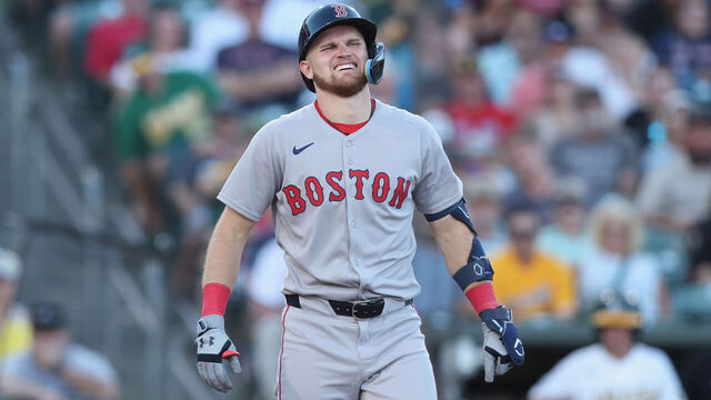 SACRAMENTO, CALIFORNIA - JULY 27: Curtis Mead #25 of the Boston Red Sox reacts after being hit by a pitch from pitcher Jack Perkins #50 of the Athletics in the top of the fourth inning at Sutter Health Park on July 27, 2026 in Sacramento, California.