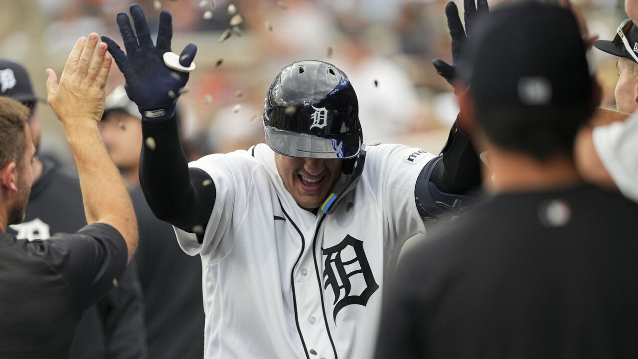DETROIT, MI - JULY 28: Eduardo Valencia #32 of the Detroit Tigers celebrates with teammates in the dugout after hitting a home run in the second inning during the game between the Baltimore Orioles and the Detroit Tigers at Comerica Park on Tuesday, July 28, 2026 in Detroit, Michigan.