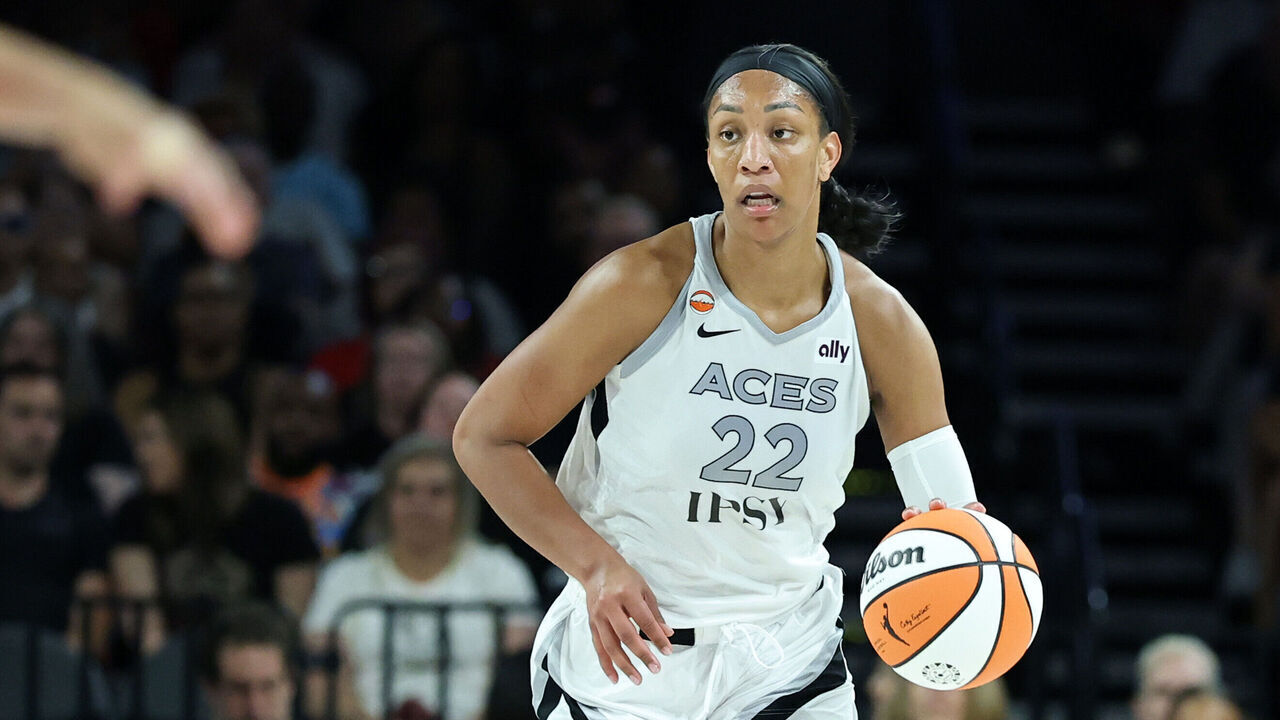 LAS VEGAS, NEVADA - JULY 28: A'ja Wilson #22 of the Las Vegas Aces brings the ball up the court against the Portland Fire in the third quarter of their game at Michelob ULTRA Arena on July 28, 2026 in Las Vegas, Nevada. The Aces defeated the Fire 98-83.