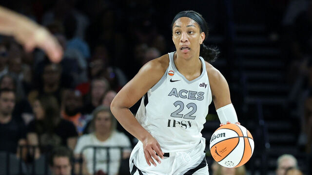 LAS VEGAS, NEVADA - JULY 28: A'ja Wilson #22 of the Las Vegas Aces brings the ball up the court against the Portland Fire in the third quarter of their game at Michelob ULTRA Arena on July 28, 2026 in Las Vegas, Nevada. The Aces defeated the Fire 98-83.