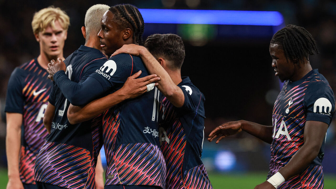 Tottenham's Mathys Tel (3rd L) celebrates with teammates after scoring a goal during the Sydney Super Cup football match between Tottenham Hotspur and Sydney FC at the Allianz Stadium in Sydney on July 29, 2026. / -- IMAGE RESTRICTED TO EDITORIAL USE - STRICTLY NO COMMERCIAL USE --