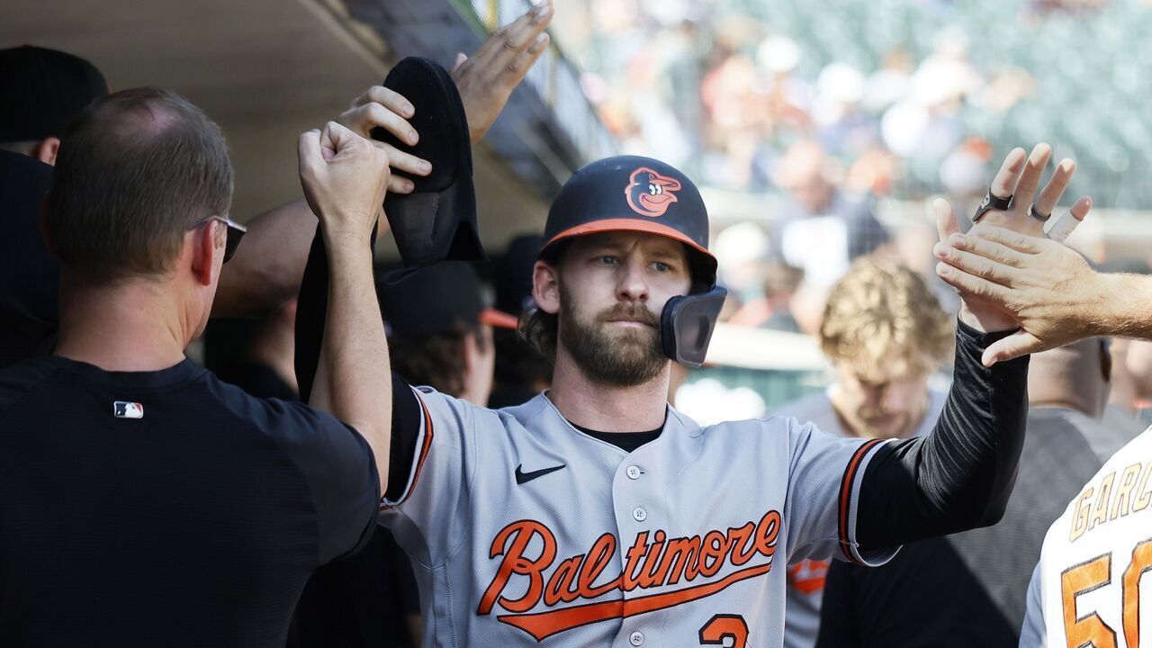 DETROIT, MI - JULY 29: Taylor Ward #3 of the Baltimore Orioles celebrates after scoring on a single by Colton Cowser to take a 10-9 lead over the Detroit Tigers during the 12th inning at Comerica Park on July 29, 2026 in Detroit, Michigan.