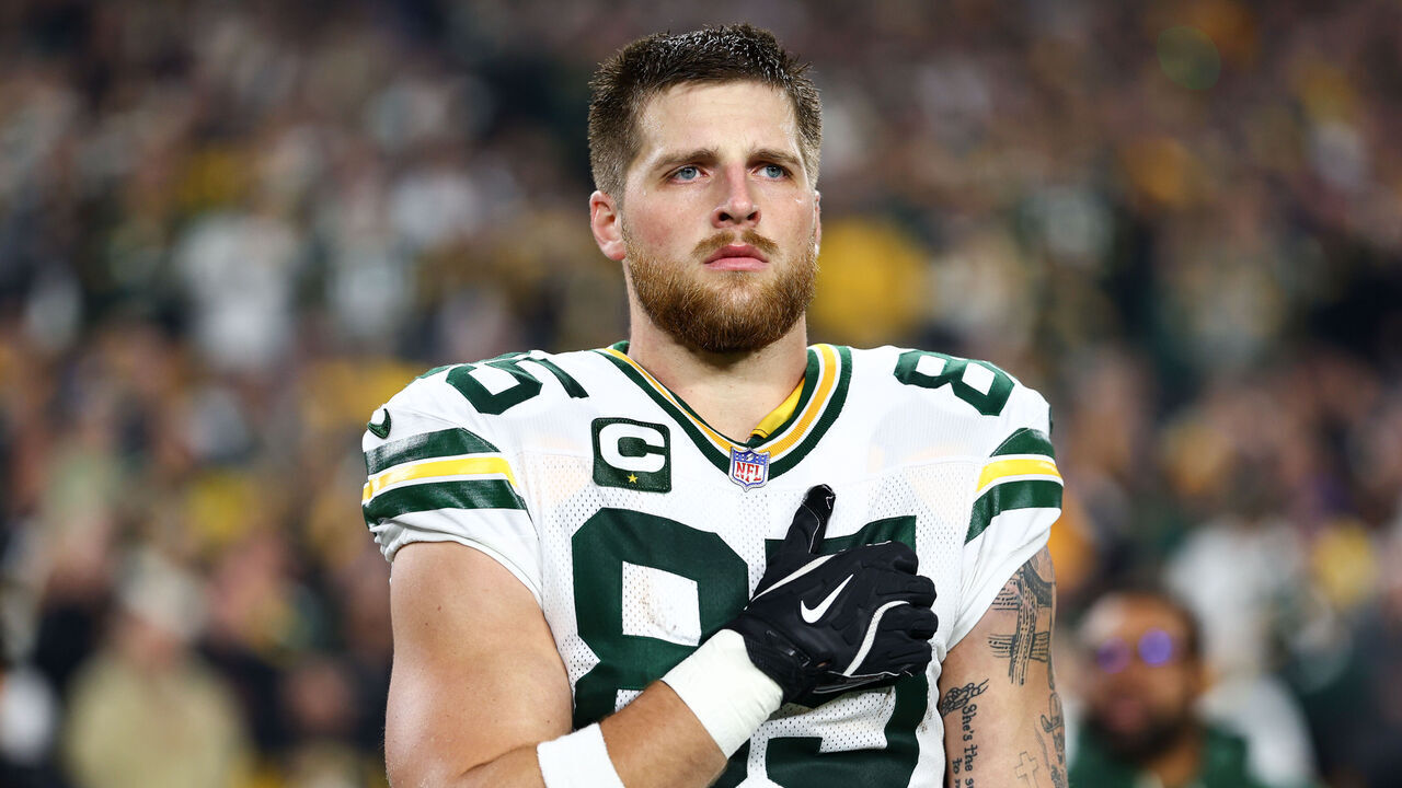 PITTSBURGH, PENNSYLVANIA - OCTOBER 26: Tucker Kraft #85 of the Green Bay Packers stands on the sideline during the national anthem prior to the game against the Pittsburgh Steelers at Acrisure Stadium on October 26, 2025 in Pittsburgh, Pennsylvania.