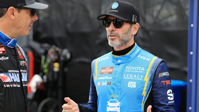 SAN DIEGO, CA - JUNE 19: Jimmie Johnson (#1 TRICON Garage Carvana Toyota) confers with Stewart Friesen (#52 Halmar Friesen Racing Halmar International Toyota) during 1st practice for the NASCAR CRAFTSMAN Truck Series Navy 250 race on Friday, June 19, 2026 at Naval Base Coronado in San Diego, CA.