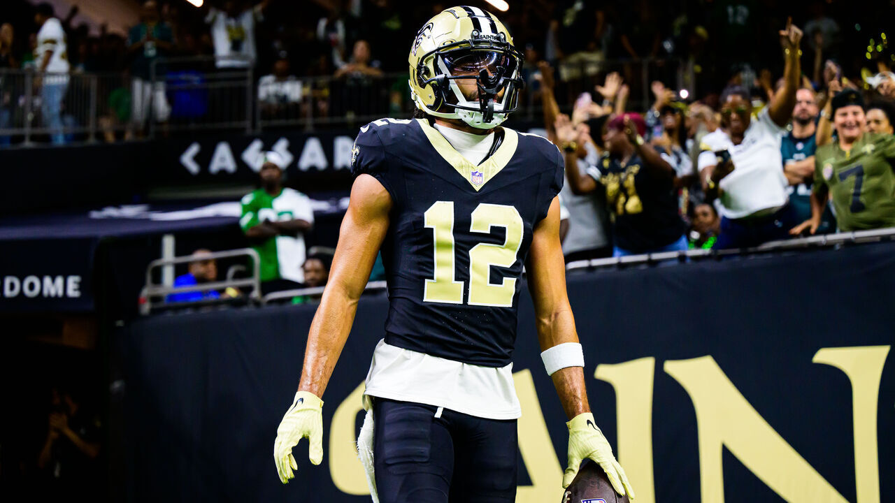 NEW ORLEANS, LOUISIANA - SEPTEMBER 22: Chris Olave #12 of the New Orleans Saints celebrates a touchdown reception against the Philadelphia Eagles during the fourth quarter at Caesars Superdome on September 22, 2024 in New Orleans, Louisiana.