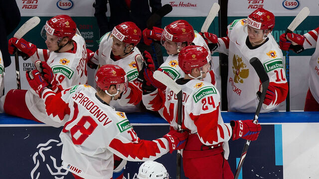 EDMONTON, AB - JANUARY 05: Ilya Safonov #24 and Yegor Spiridonov #18 of Russia celebrate a goal against Finland during the 2021 IIHF World Junior Championship bronze medal game at Rogers Place on January 5, 2021 in Edmonton, Canada.