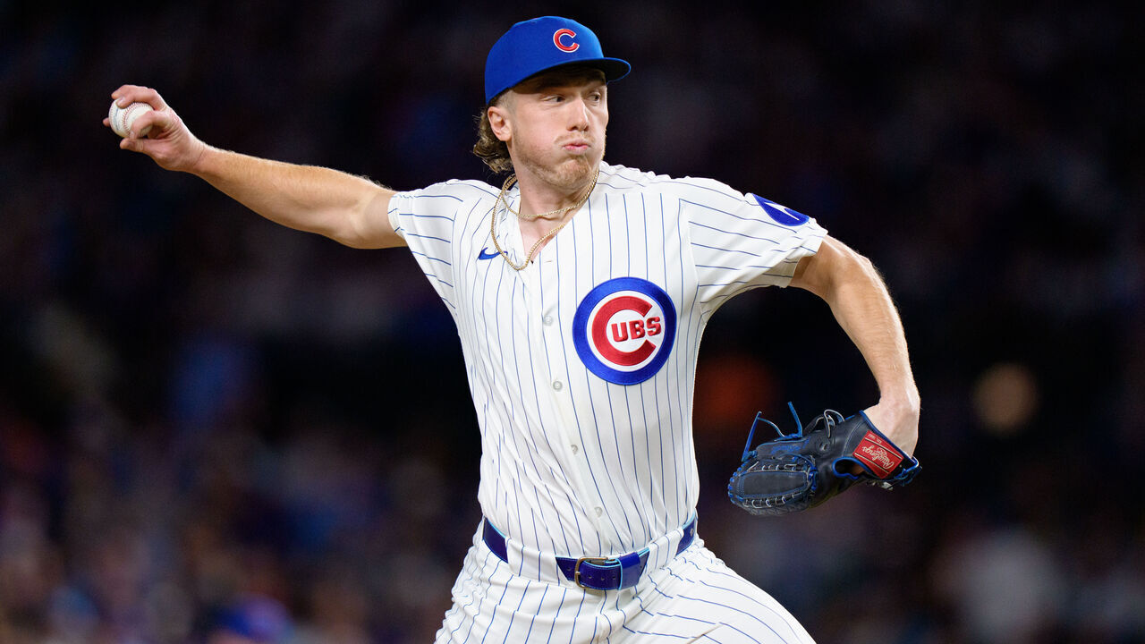 CHICAGO, ILLINOIS - JULY 22: Gavin Hollowell #46 of the Chicago Cubs pitches in a game against the Detroit Tigers at Wrigley Field on July 22, 2026 in Chicago, Illinois.