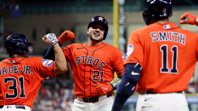 HOUSTON, TX - JULY 31: Yainer Diaz #21 of the Houston Astros celebrates with teammates after hitting a solo home run in the seventh inning during the game between the Texas Rangers and the Houston Astros at Daikin Park on Friday, July 31, 2026 in Houston, Texas.