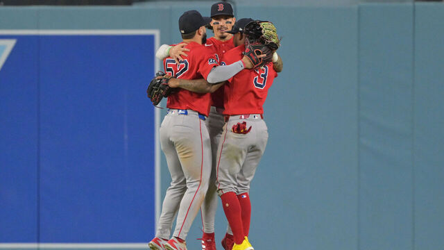LOS ANGELES, CALIFORNIA - JULY 31: Wilyer Abreu #52, Jarren Duran #16 and Ceddanne Rafaela #3 of the Boston Red Sox celebrate after the final out of the ninth inning after defeating the Los Angeles Dodgers at Dodger Stadium on July 31, 2026 in Los Angeles, California.
