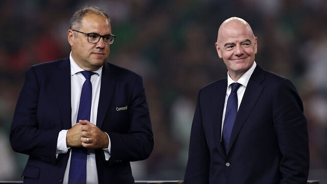 HOUSTON, TEXAS - JULY 06: CONCACAF President Victor Montagliani (L) and FIFA President Gianni Infantino look on during the trophy ceremony after Mexico beat the United States 2-1 to win the CONCACAF Gold Cup 2025 between the United States and Mexico at NRG Stadium on July 06, 2025 in Houston, Texas.