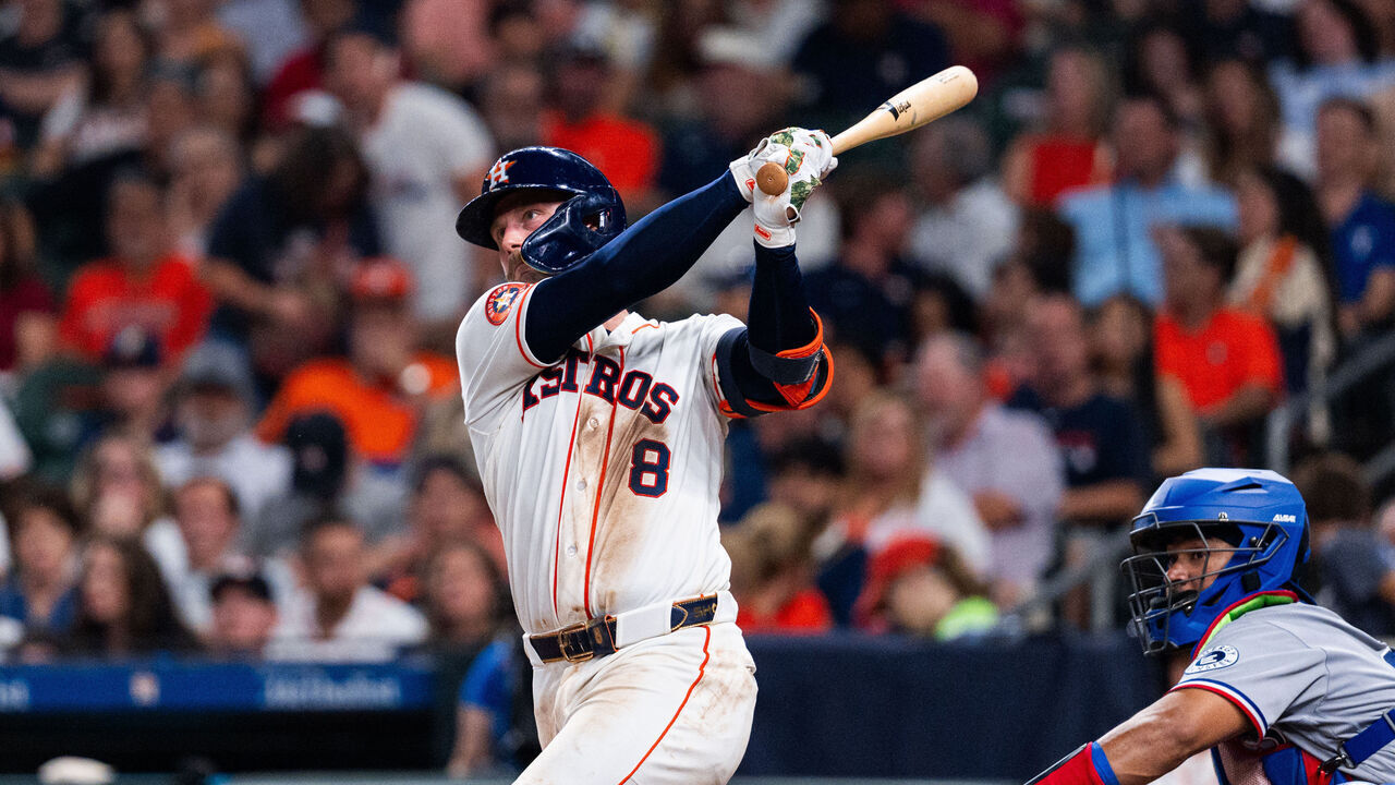 HOUSTON, TEXAS - AUGUST 01: Christian Walker #8 of the Houston Astros hits a double in the seventh inning during the game against the Texas Rangers at Daikin Park on August 01, 2026 in Houston, Texas.