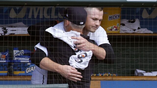 DETROIT, MI - JULY 29: Starting pitcher Tarik Skubal #29 of the Detroit Tigers, right, and manager A.J. Hinch #14 hug in the dugout after Skubal was pulled from the game against the Baltimore Orioles during the seventh inning at Comerica Park on July 29, 2026 in Detroit, Michigan. Skubal recorded his 1,000th career strikeout against Taylor Ward of the Baltimore Orioles in the first inning of the game.