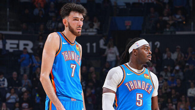 OKLAHOMA CITY, OK - DECEMBER 31: Chet Holmgren #7 and Luguentz Dort #5 of the Oklahoma City Thunder looks on during the game against the Portland Trail Blazers on December 31, 2025 at Paycom Center in Oklahoma City, Oklahoma. Mandatory Copyright Notice: Copyright 2025 NBAE