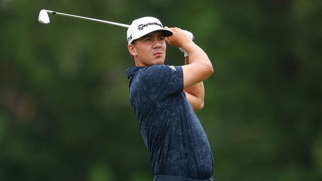 DETROIT, MICHIGAN - AUGUST 02: Michael Thorbjornsen of the United States plays his shot from the ninth tee during the final round of the Rocket Classic 2026 at Detroit Golf Club on August 02, 2026 in Detroit, Michigan.