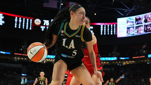 PORTLAND, OREGON - AUGUST 02: Dearica Hamby #5 of the Los Angeles Sparks dribbles against Bridget Carleton #6 of the Portland Fire during the second half at Moda Center on August 02, 2026 in Portland, Oregon.