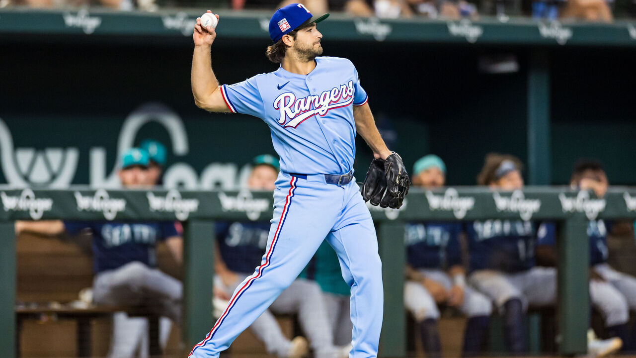 ARLINGTON, TEXAS - JULY 26: Josh Smith #8 of the Texas Rangers throws the ball during the game against the Seattle Mariners at Globe Life Field on July 26, 2026 in Arlington, Texas.