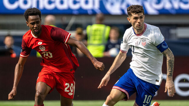 INGLEWOOD, CALIFORNIA - MARCH 23: Christian Pulisic #10 of United States is chased by Ali Ahmed #20 of Canada during the first half of the CONCACAF Nations League 3rd Place Match between the United States and Canada at SoFi Stadium on March 23, 2025 in Inglewood, California. Canada won the match 2-1.