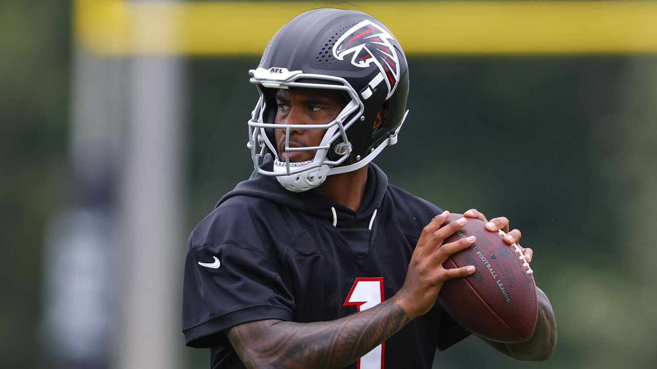FLOWERY BRANCH, GEORGIA - MAY 27: Tua Tagovailoa #1 of the Atlanta Falcons runs through drills during OTA's at IBM Performance Field on May 27, 2026 in Flowery Branch, Georgia.