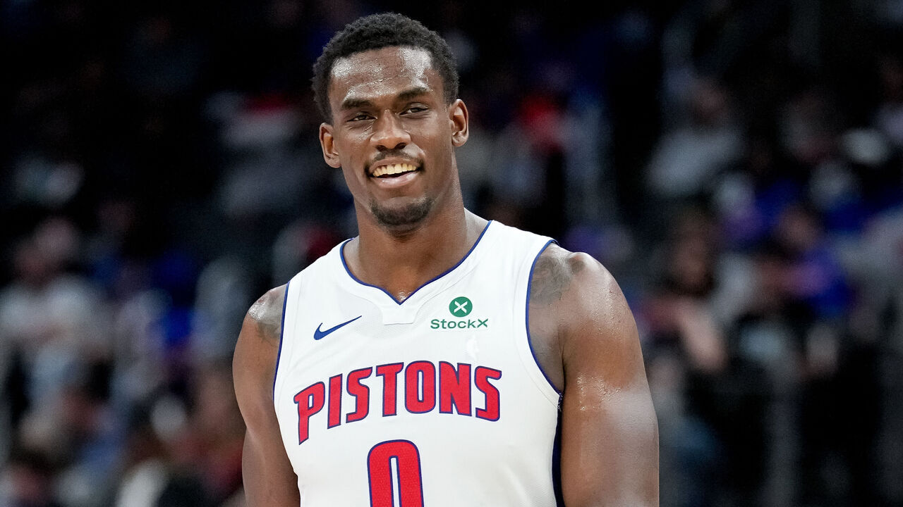 DETROIT, MICHIGAN - MARCH 31: Jalen Duren #0 of the Detroit Pistons looks on and smiles against the Toronto Raptors at Little Caesars Arena on March 31, 2026 in Detroit, Michigan.