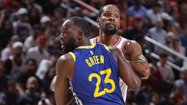 HOUSTON, TX - MARCH 5: Kevin Durant #7 of the Houston Rockets is guarded by Draymond Green #23 of the Golden State Warriors during the game on March 5, 2026 at the Toyota Center in Houston, Texas. Mandatory Copyright Notice: Copyright 2026 NBAE
