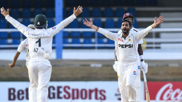 Bowler Ali Usman (R) of Pakistan celebrates after he caught and bowled batter Roston Chase (unseen) of West Indies during the third day of the second Test match between West Indies and Pakistan at Queen's Park Oval in Port of Spain, Trinidad and Tobago, on August 4, 2026.