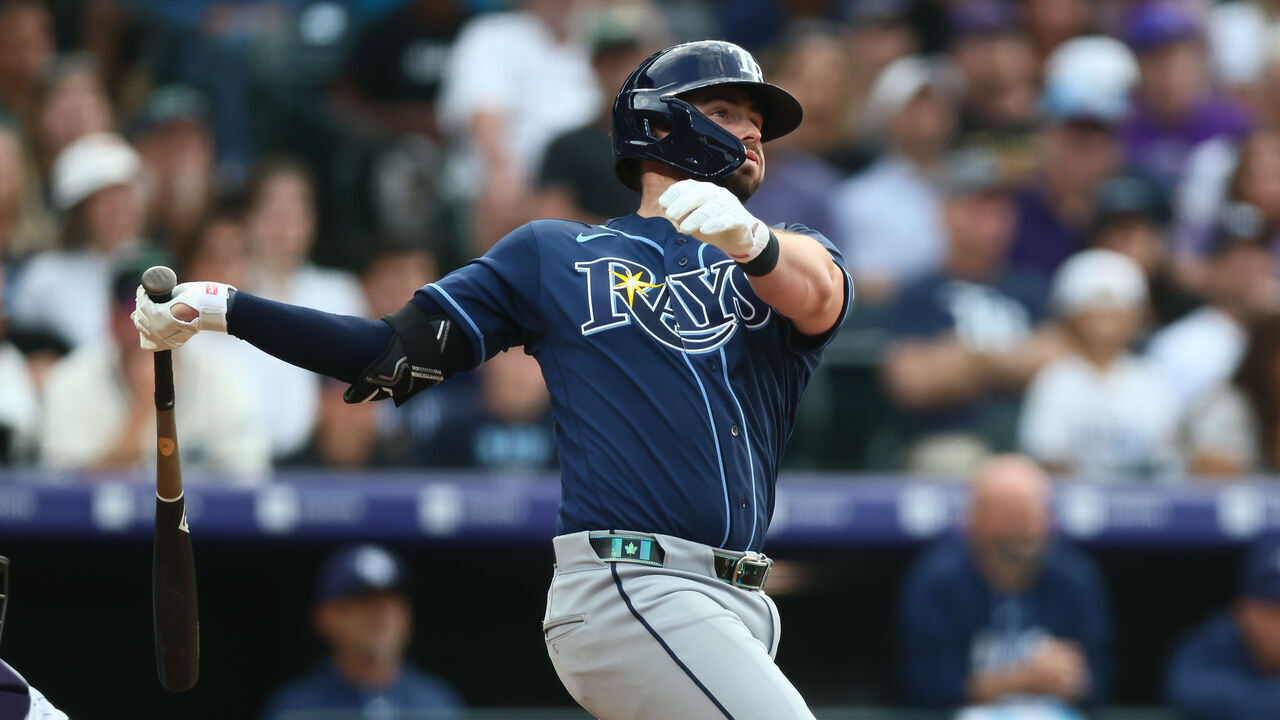 DENVER, CO - AUGUST 4: Liam Hicks #34 of the Tampa Bay Rays hits a grand slam in the third inning against the Colorado Rockies at Coors Field on August 4, 2026 in Denver, Colorado.