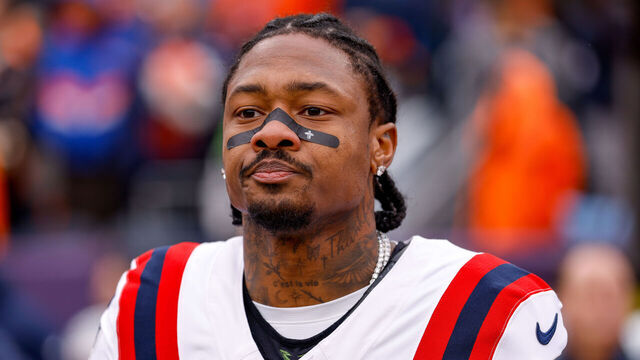 DENVER, COLORADO - JANUARY 25: Stefon Diggs #8 of the New England Patriots stands for the national anthem prior to the AFC Championship game against the Denver Broncos at Empower Field At Mile High on January 25, 2026 in Denver, Colorado.