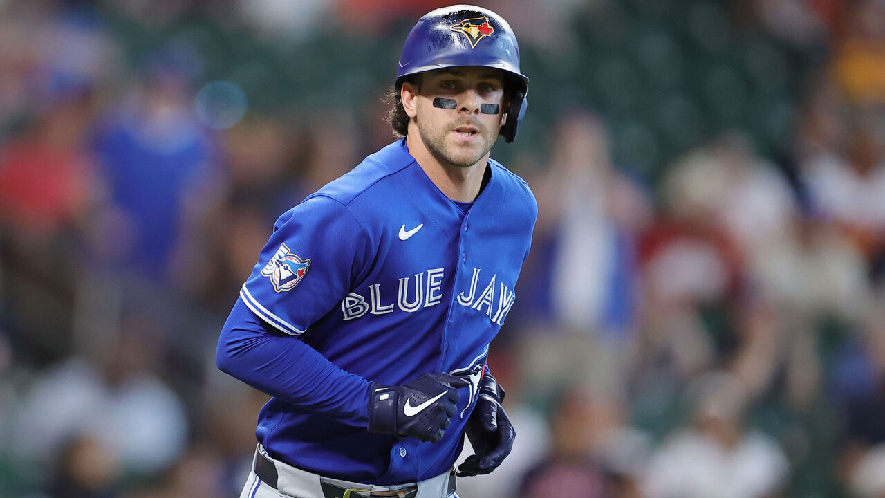 HOUSTON, TEXAS - AUGUST 05: Ernie Clement #22 of the Toronto Blue Jays runs the bases after hitting a two run home run during the tenth inning against the Houston Astros at Daikin Park on August 05, 2026 in Houston, Texas.