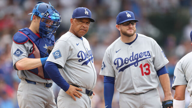 CHICAGO, ILLINOIS - AUGUST 05: Manager Dave Roberts #30 of the Los Angeles Dodgers reacts against the Chicago Cubs during the seventh inning at Wrigley Field on August 05, 2026 in Chicago, Illinois.
