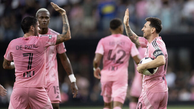 MIAMI, FLORIDA - AUGUST 5: Lionel Messi #10 of Inter Miami CF (R) high-fives teammate Rodrigo De Paul #7 after scoring a goal during the Leagues Cup Phase One match between Inter Miami CF and Atletico San Luis at Nu Stadium on August 5, 2026 in Miami, Florida.