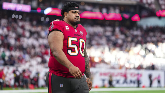 HOUSTON, TX - SEPTEMBER 15: Vita Vea #50 of the Tampa Bay Buccaneers walks out for the coin toss prior to an NFL football game against the Houston Texans at NRG Stadium on September 15, 2025 in Houston, Texas.
