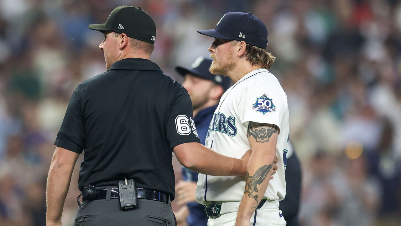 SEATTLE, WASHINGTON - AUGUST 05: Gabe Speier #55 of the Seattle Mariners is held back after hitting a batter during the eighth inning against the Detroit Tigers at T-Mobile Park on August 05, 2026 in Seattle, Washington.