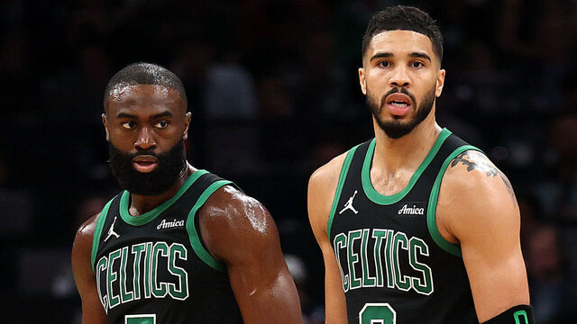 BOSTON, MASSACHUSETTS - APRIL 29: Jayson Tatum #0 of the Boston Celtics and Jaylen Brown #7 look on in Game Five of the Eastern Conference First Round NBA Playoffs against the Orlando Magic at TD Garden on April 29, 2025 in Boston, Massachusetts.