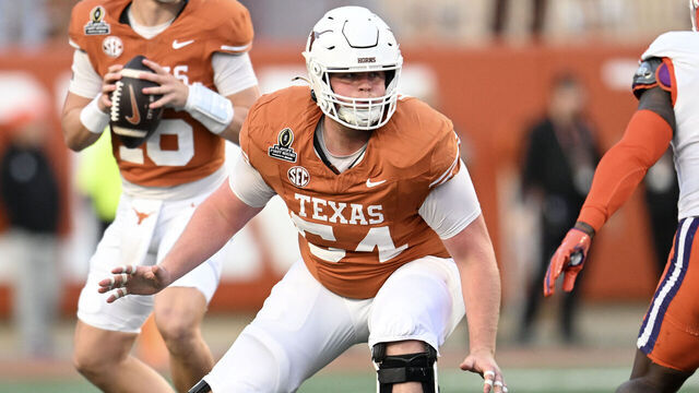 AUSTIN, TEXAS - DECEMBER 21: Cole Hutson #54 of the Texas Longhorns blocks against the Clemson Tigers during the second half of the Playoff First Round Game at Darrell K Royal-Texas Memorial Stadium on December 21, 2024 in Austin, Texas.
