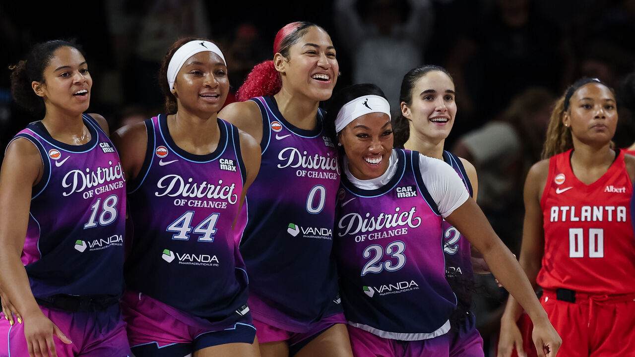 WASHINGTON, DC - AUGUST 07: Cassandre Prosper #18, Kiki Iriafen #44, Shakira Austin #0, Cotie McMahon #23, and Sonia Citron #22 of the Washington Mystics celebrate after the game against the Atlanta Dream at CareFirst Arena on August 7, 2026 in Washington, DC.