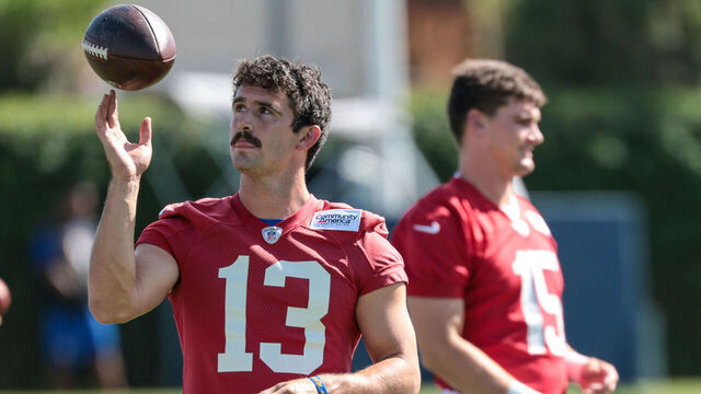 Los Angeles, CA - July 26, 2026: LA Rams quarterback Stetson Bennett, 13, stands alongside quarterback Ty Simpson at the first day of training camp at Loyola Marymount University in Los Angeles, CA on Sunday, July 26, 2026. (Robert Gauthier/Los Angeles Times via Getty Images)