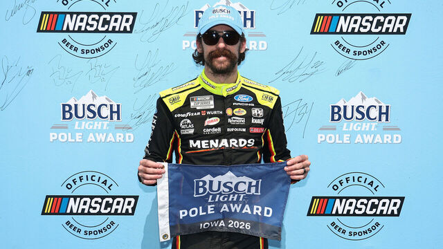 NEWTON, IOWA - AUGUST 08: Ryan Blaney, driver of the #12 Menards/Pennington Ford, poses for photos after winning the pole award during qualifying for the NASCAR Cup Series Iowa Corn 350 Powered by Ethanol at Iowa Speedway on August 08, 2026 in Newton, Iowa.