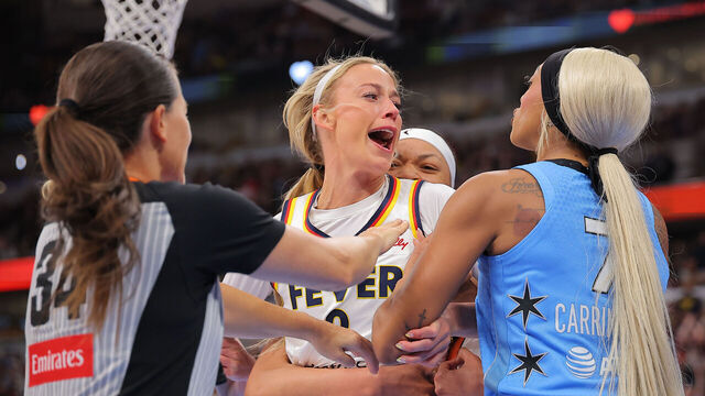 CHICAGO, IL - AUGUST 08: Sophie Cunningham #8 of the Indiana Fever reacts to DiJonai Carrington #7 of the Chicago Sky foul during the first half on August 8, 2026 at the United Center in Chicago, Illinois.