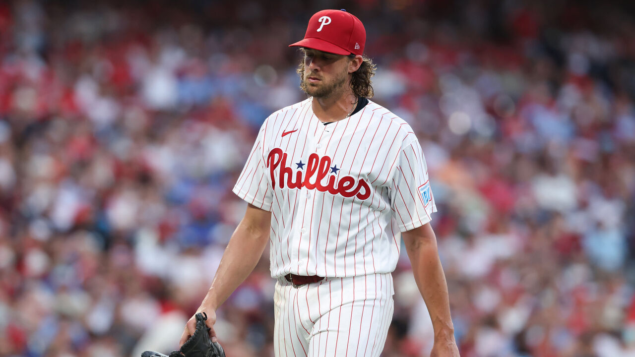 PHILADELPHIA, PENNSYLVANIA - AUGUST 3: Pitcher Aaron Nola #27 of the Philadelphia Phillies between innings against the Washington Nationals at Citizens Bank Park on August 3, 2026 in Philadelphia, Pennsylvania.