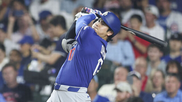 CHICAGO, IL - AUGUST 04: Shohei Ohtani #17 of the Los Angeles Dodgers singles in the sixth inning during the game between the Los Angeles Dodgers and the Chicago Cubs at Wrigley Field on Tuesday, August 4, 2026 in Chicago, Illinois.