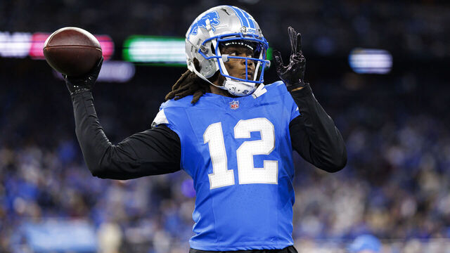 DETROIT, MICHIGAN - JANUARY 18: Quarterback Teddy Bridgewater #12 of the Detroit Lions warms up during an NFL football divisional playoff game against the Washington Commanders, at Ford Field on January 18, 2025 in Detroit, Michigan.