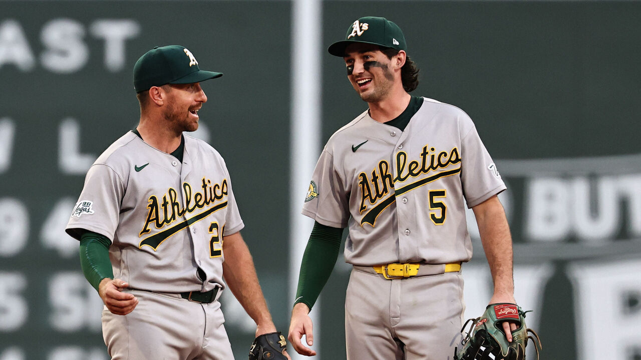 BOSTON, MA - AUGUST 8: Donovan Walton #29 (L) and Jacob Wilson #5 of the Athletics celebrate after their 7-3 win over the Boston Red Sox at Fenway Park on August 8, 2026 in Boston, Massachusetts.