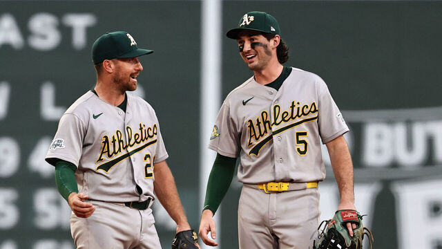 BOSTON, MA - AUGUST 8: Donovan Walton #29 (L) and Jacob Wilson #5 of the Athletics celebrate after their 7-3 win over the Boston Red Sox at Fenway Park on August 8, 2026 in Boston, Massachusetts.