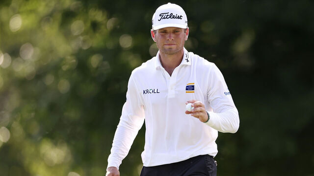 GREENSBORO, NORTH CAROLINA - AUGUST 09: Michael Brennan of the United States acknowledges the crowd on the 14th green during the final round of the Wyndham Championship 2026 at Sedgefield Country Club on August 09, 2026 in Greensboro, North Carolina.