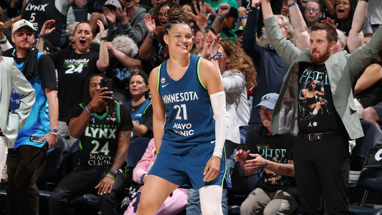 MINNEAPOLIS, MN - AUGUST 9: Kayla McBride #21 of the Minnesota Lynx celebrates she scores her tenth three point basket to break the WNBA Record for most three pointers made in a game during the game against the Dallas Wings on August 9, 2026 at Target Center in Minneapolis, Minnesota. Mandatory Copyright Notice: Copyright 2026 NBAE